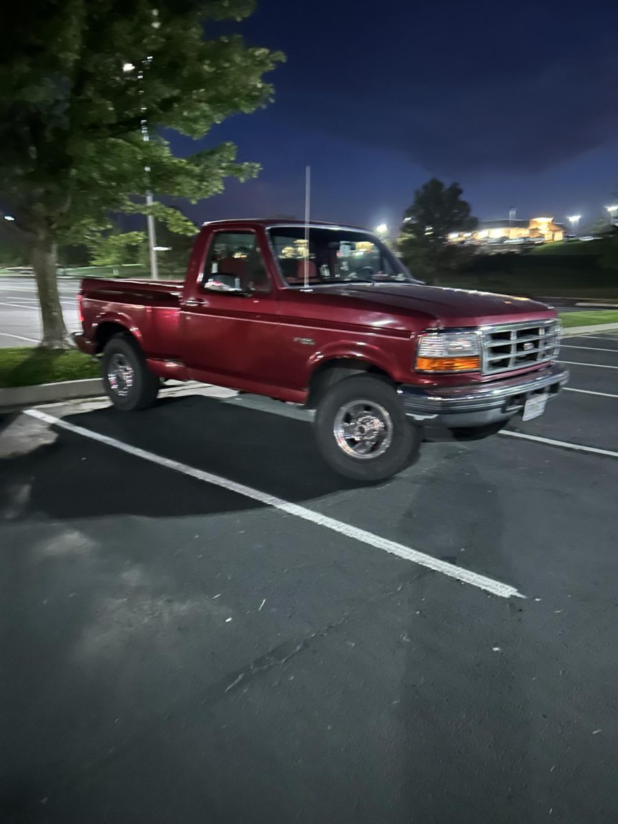 Red truck under the night lights 