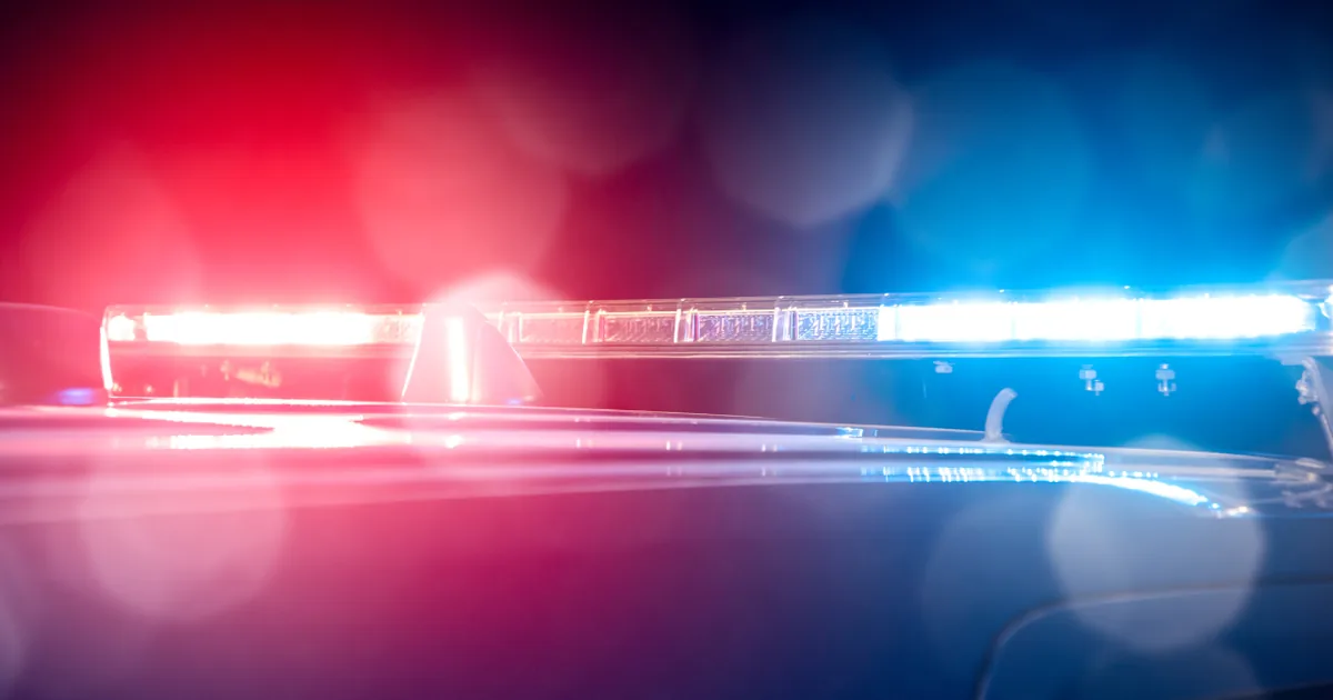 Law enforcement vehicle on a Wyoming road during an arrest after a high-speed pursuit