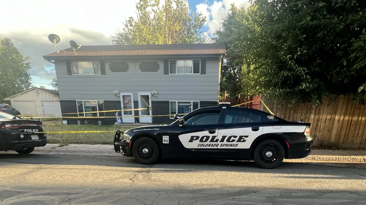Police tape outside a home during a death investigation in Colorado Springs