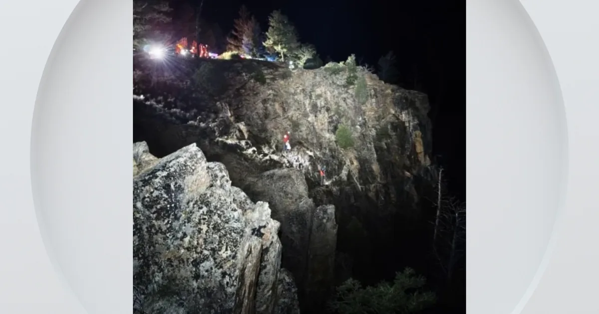Rescue crews use ropes to reach a UTV rider after a 250-foot fall in Colorado